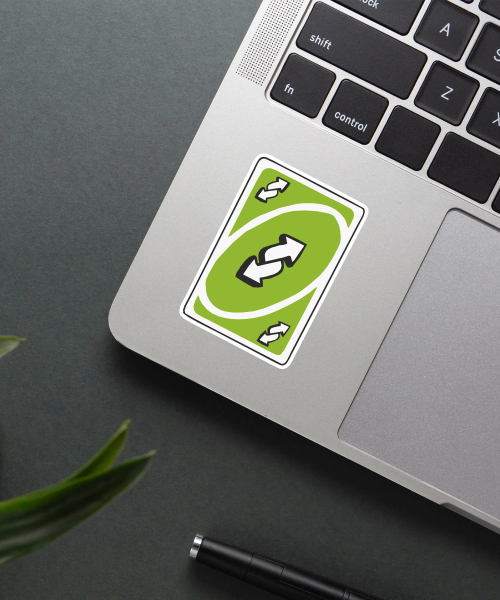 Mockup of Epic Uno Reverse Sticker on a laptop.