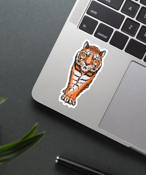 Mockup of the Epic Tiger Sticker applied on a laptop.