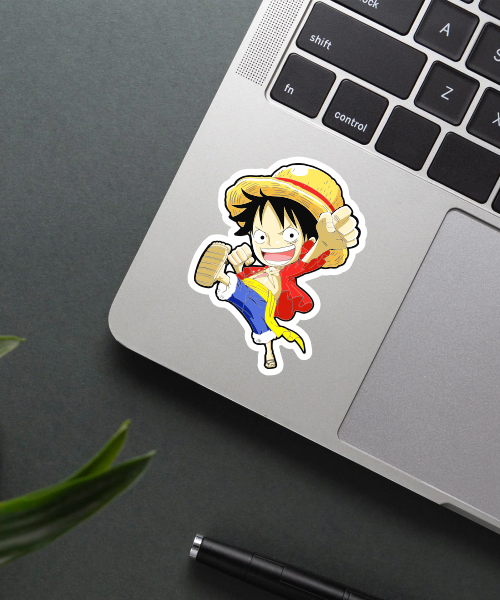 monkey d luffy anime sticker on laptop showing straw hat and fighting pose