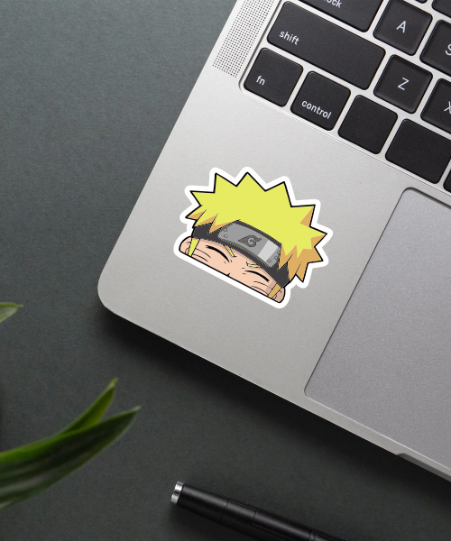 naruto sticker on phone surface showing peeking face and yellow hair