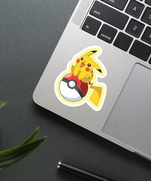 pikachu cartoon sticker on laptop surface showing bright colors and glowing effect