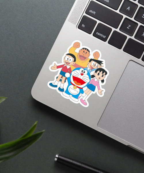 doraemon and friends cartoon sticker on laptop surface showing happy group