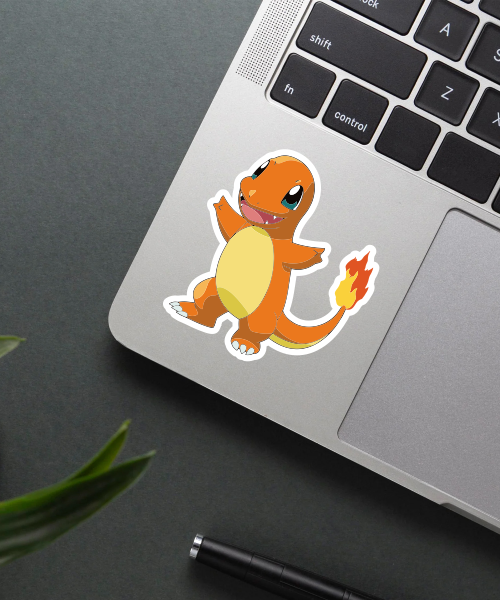 charmander pokemon sticker on laptop surface showing bright flame tail and colorful design