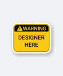 warning designer here sticker