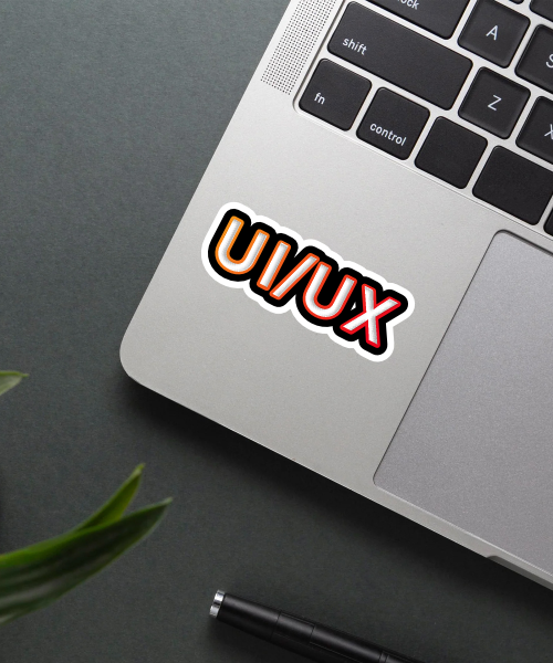 UI/UX sticker placed on a laptop, highlighting its bold design.