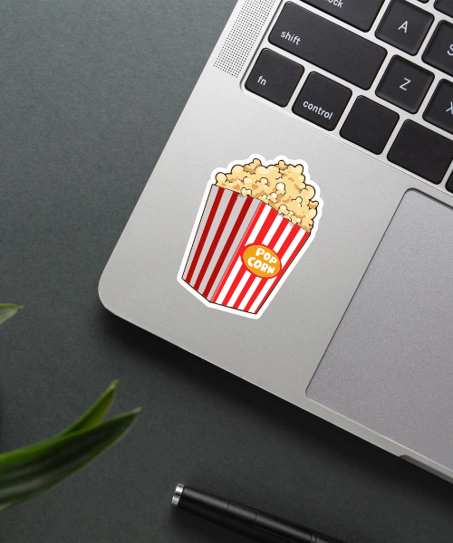 Pop Corn sticker on a laptop surface.