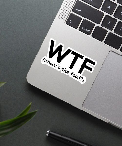 Where's the food sticker on a laptop surface.
