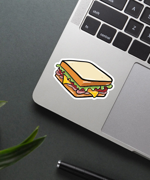 Bread sandwich sticker on a laptop surface.