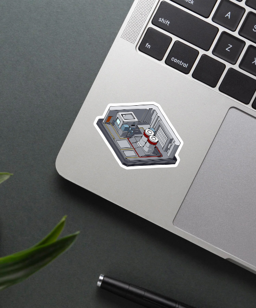 Counter Strike map sticker on a laptop surface.