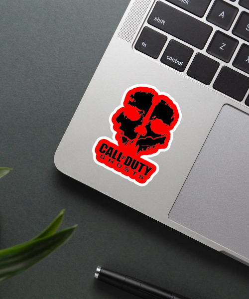 COD Ghosts sticker on a gaming console.