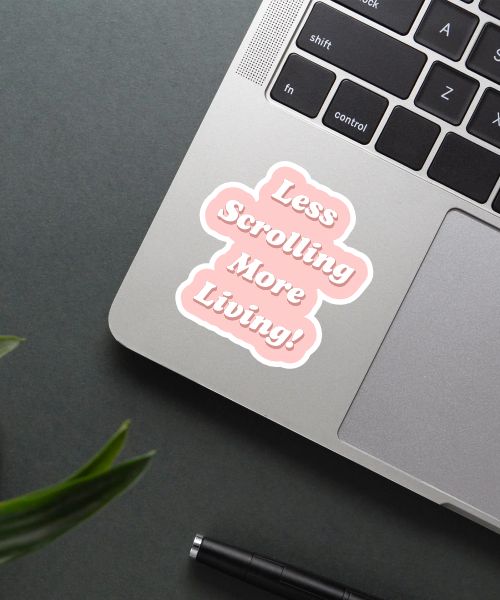 Mockup of Motivational Less Living Sticker on a laptop.