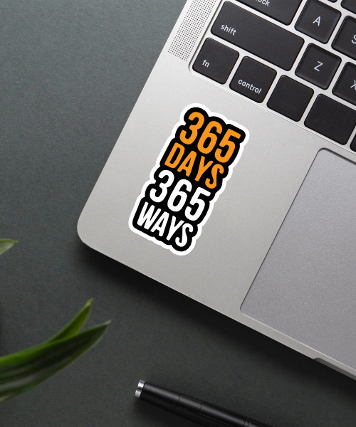Mockup showing the 365 Days 365 Ways sticker on a laptop.