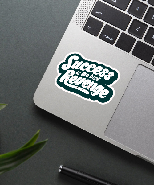 Mockup showing the Success is the Best Revenge sticker on a laptop.