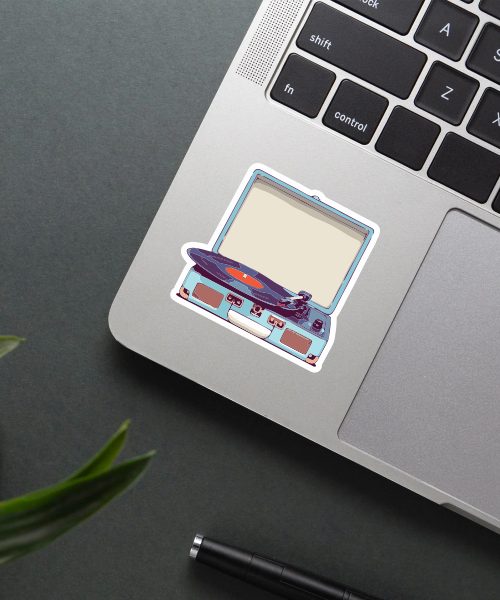 music sticker with vintage record player on laptop surface