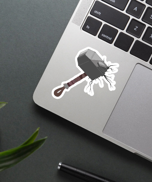 thor mjolnir sticker on laptop showing lightning cracks and hammer details