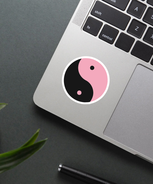 black pink logo sticker on laptop showing pink and black band logo
