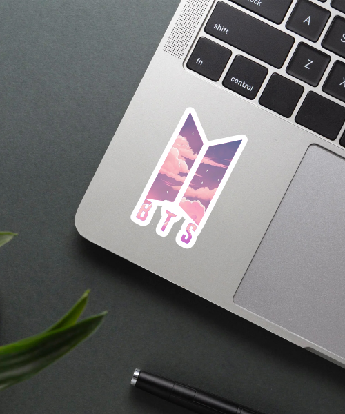 bts kpop logo vinyl sticker on laptop surface showing pink purple cloud background