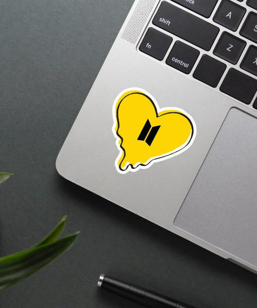 bts butter vinyl sticker applied on a water bottle showing yellow melting heart and black logo