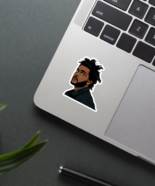 weeknd face sticker vinyl sticker applied on phone surface showing detailed dark portrait
