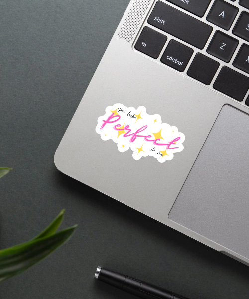 you look perfect vinyl sticker applied on phone case showing pink script and yellow stars
