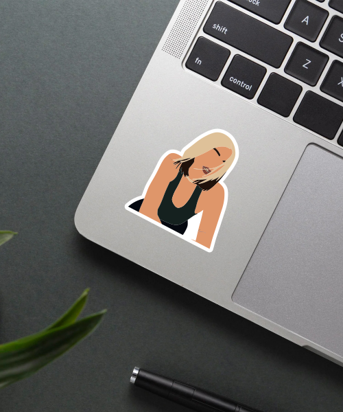 dua lipa don't start now sticker on laptop surface showing blonde hair and black top