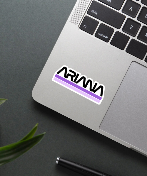 Ariana name bold black purple stripes vinyl sticker on laptop surface showing clean modern design