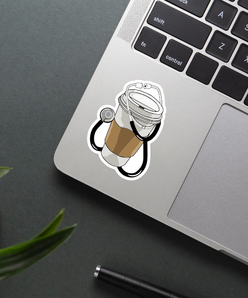 doctor coffee cup sticker on laptop surface showing medical and coffee theme