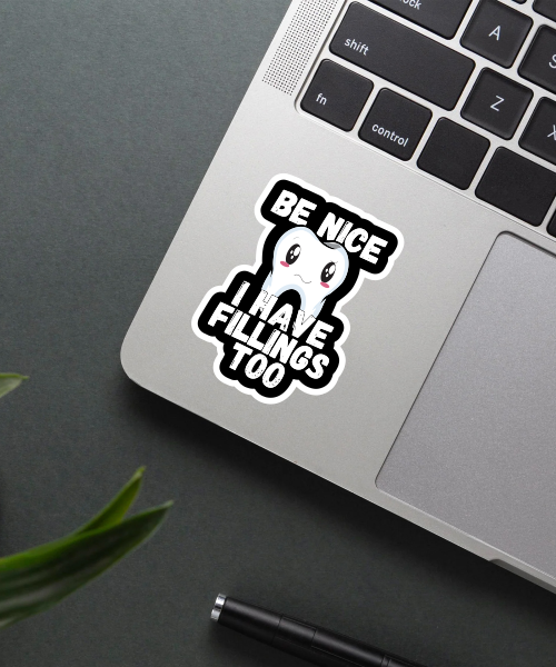 i have fillings too sticker on laptop surface showing cute tooth character and bold text