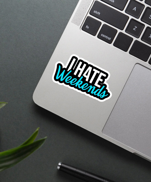 i hate weekends sticker on laptop surface showing bold white and blue text