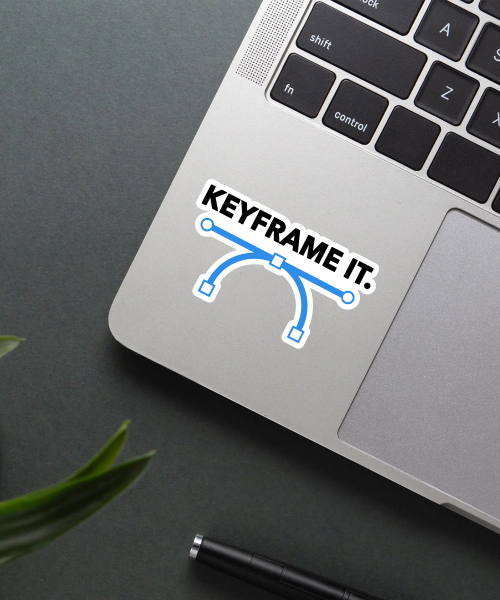 keyframe it animation sticker on laptop surface showing bold text and blue curve
