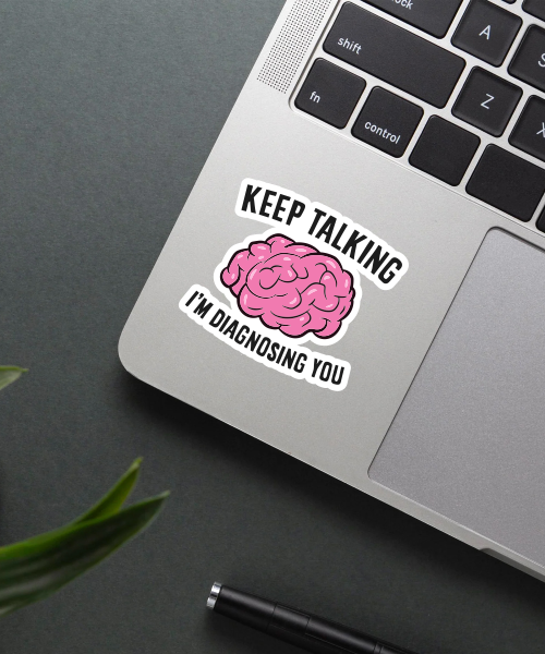 keep talking psychologist sticker on laptop surface showing pink brain and bold text