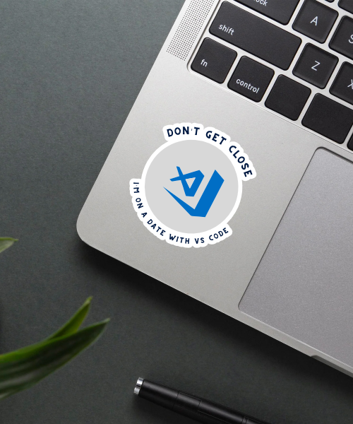 Mockup of VS Code sticker applied on a laptop.