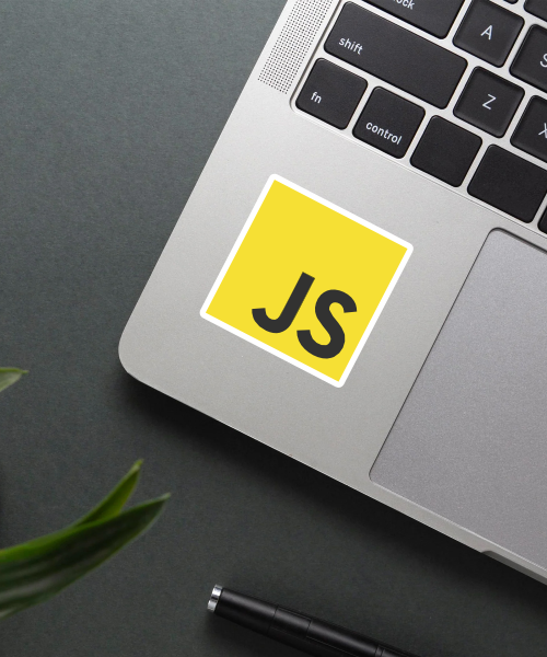 Mockup of JavaScript sticker applied on a laptop.