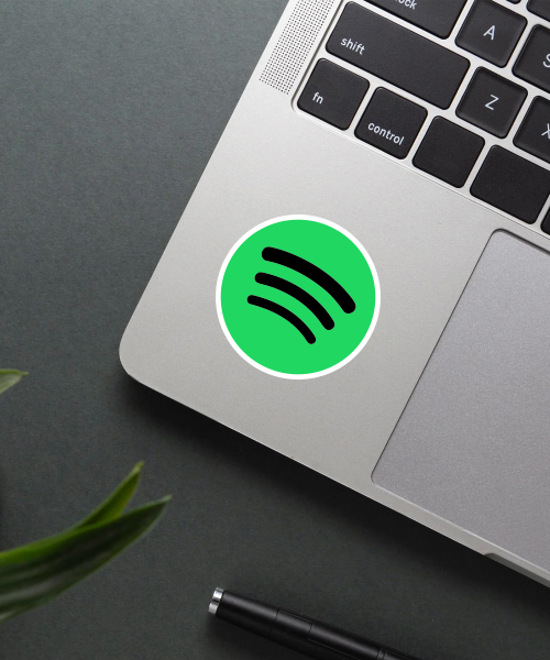 spotify logo vinyl sticker on water bottle surface showing green circle and black waves