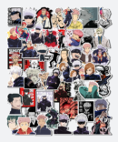 jujutsu kaisen sticker pack on laptop surface showing anime character stickers