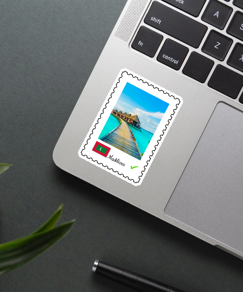 Mockup of Maldives Travel sticker showing blue sea and wooden huts in postage stamp design, perfect for beach lovers.