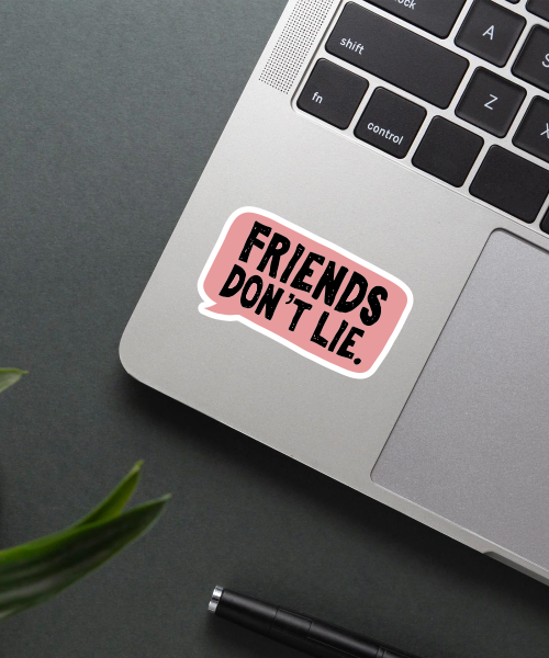 friends don’t lie sticker on phone surface showing pink speech bubble and black text