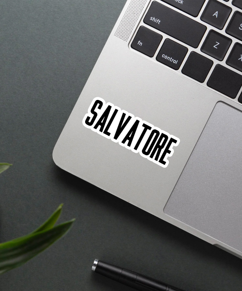 salvatore sticker on laptop surface showing bold black text
