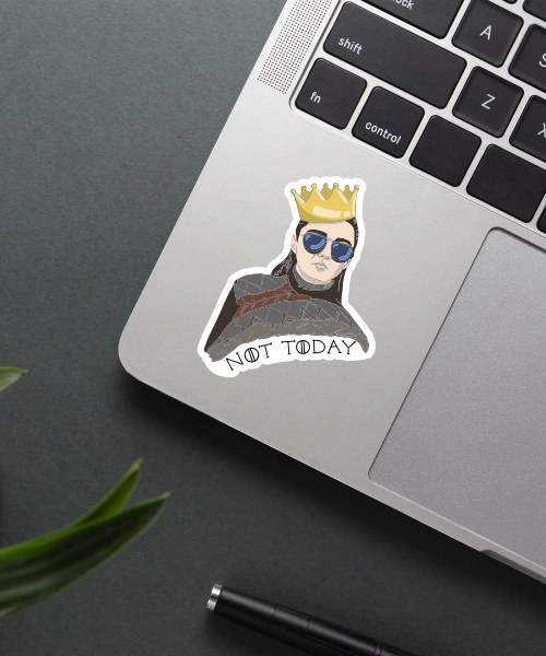 not today jon snow sticker on laptop surface showing black cloak and gold crown