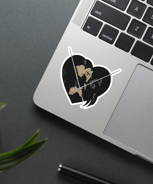 wednesday mom dad sticker on laptop surface showing black heart and sword details