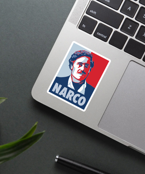 narco sticker on laptop surface showing pop art portrait and text