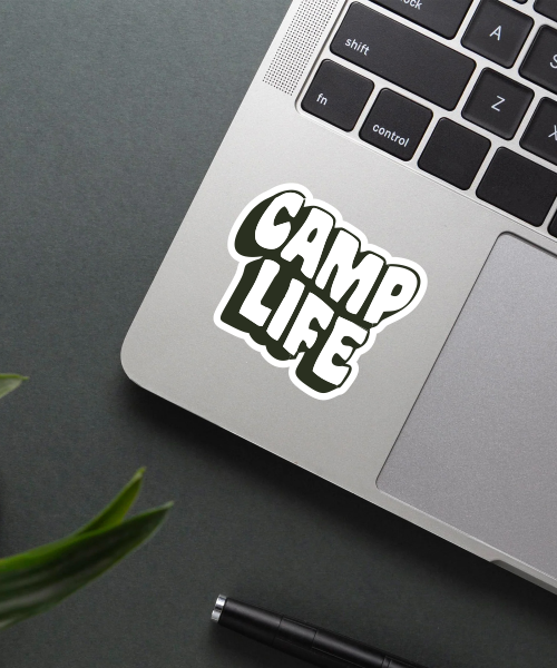 Mockup of Camp Life sticker showing bold black text on white background, perfect for camping lovers.