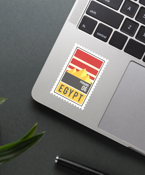 Mockup showing Egypt Pyramid Travel Sticker on laptop with yellow and red colors