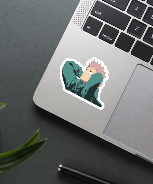 yuji itadori anime sticker on laptop surface showing casual pose and green hoodie