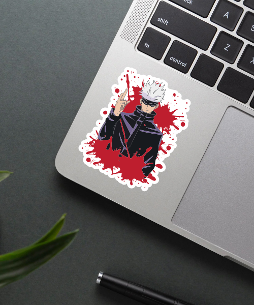 bloody gojo satoru vinyl sticker on laptop surface showing red splash background