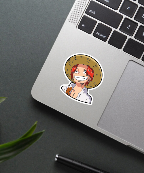 one piece shanks sticker on laptop surface showing vibrant colors and clear design