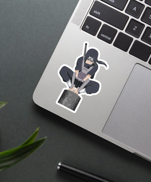 itachi uchiha naruto anime sticker on laptop showing fierce ninja pose