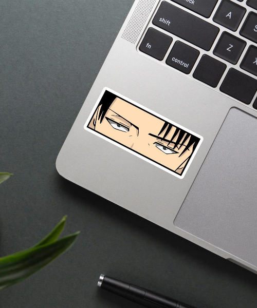 levi killer stare sticker on laptop surface showing intense anime eyes close-up
