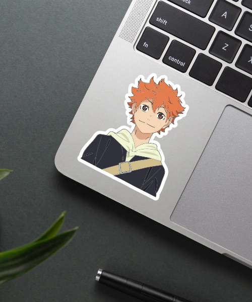 shoyo hinata anime sticker on laptop surface showing bright colors and casual style