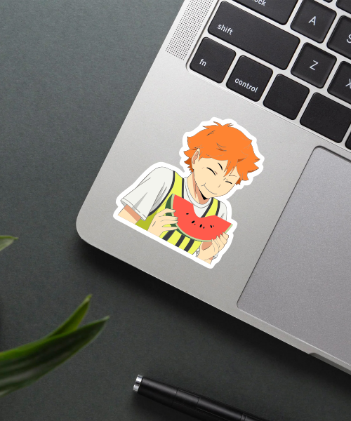 hungry shoyo hinata haikyuu sticker on laptop showing playful anime character eating watermelon